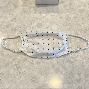 White and black polka dot mask